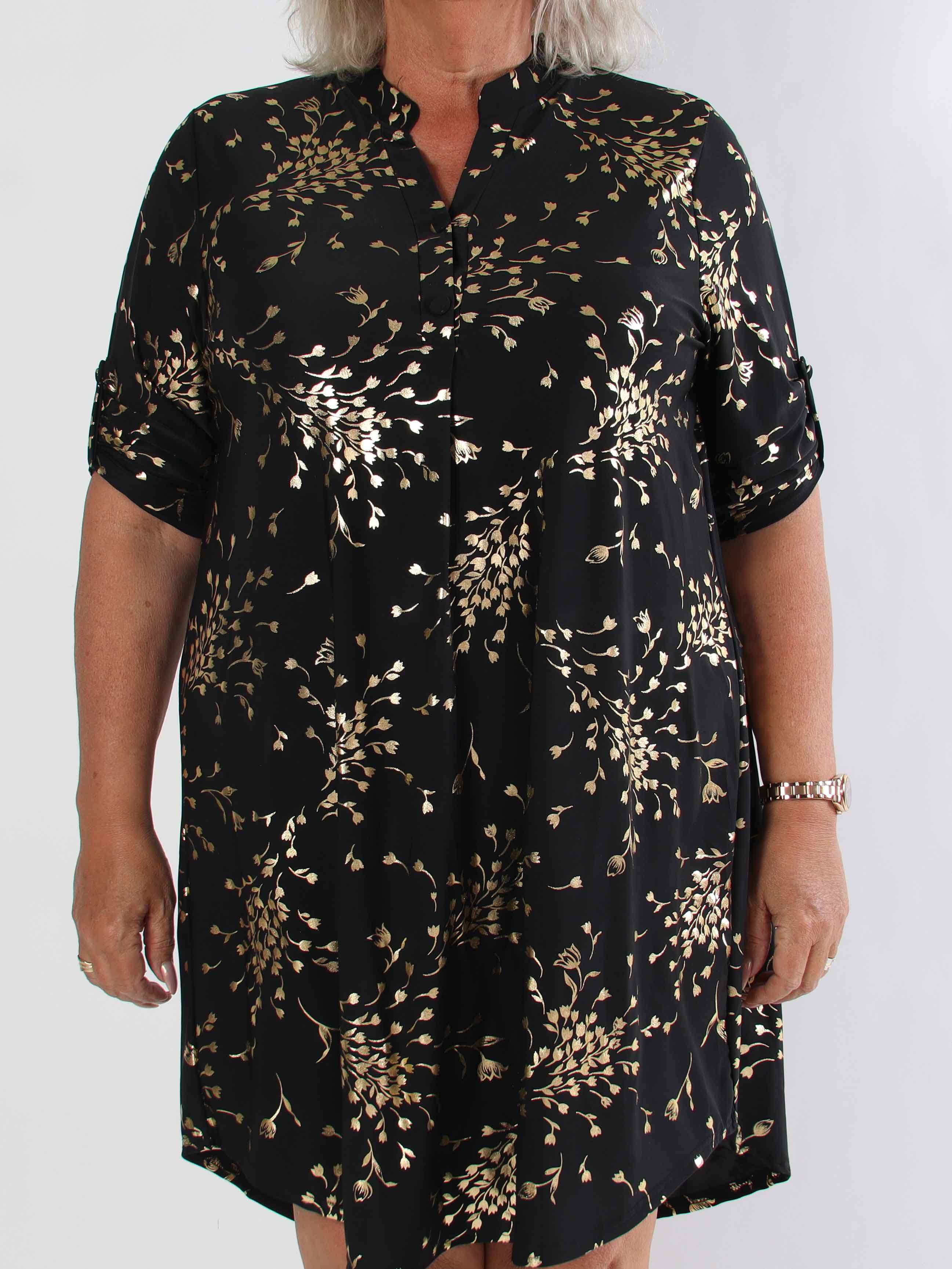 Ebba Gold Leaf Long - Elastisk enfärgad plus size klänning med guld blommigt mönster
